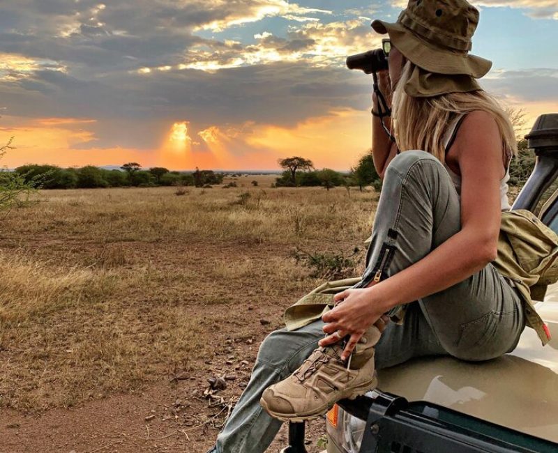 woman-vehicle-field-against-sky-sunset_1048944-491209